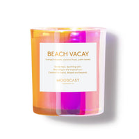 Colorful candle labeled 'Beach Vacay' by Moodcast on a white background