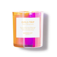 Colorful candle with a label on a white background