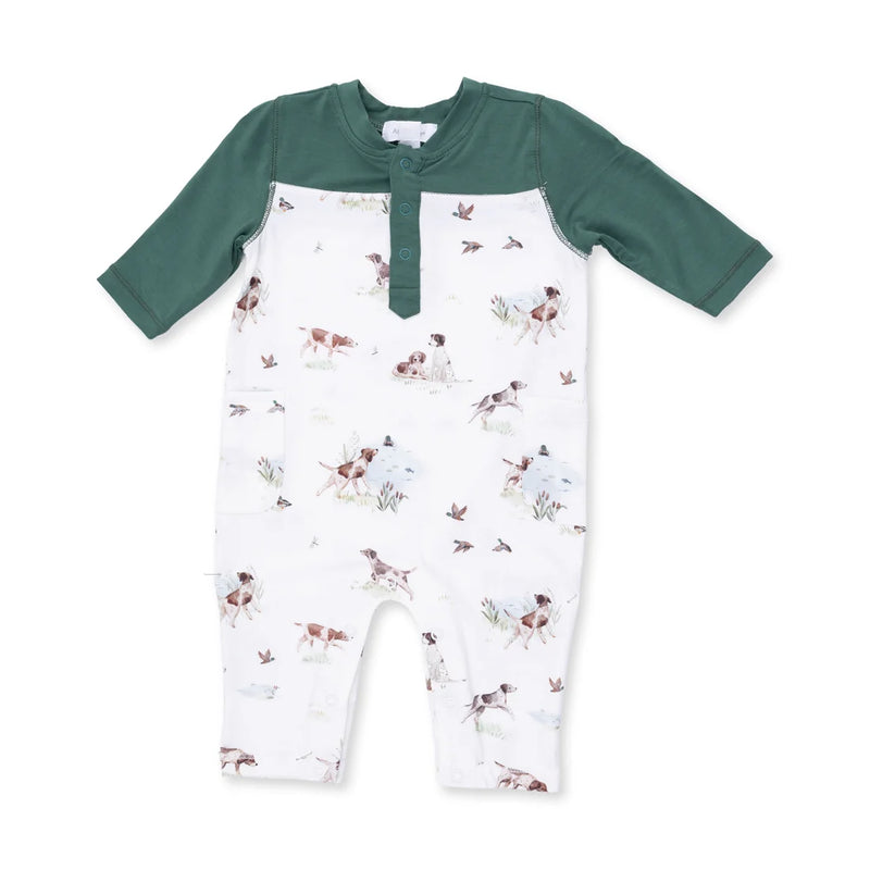 Baby romper with green sleeves and white pattern on a white background