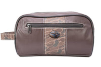 Brown leather toiletry bag with camouflage pattern on a white background