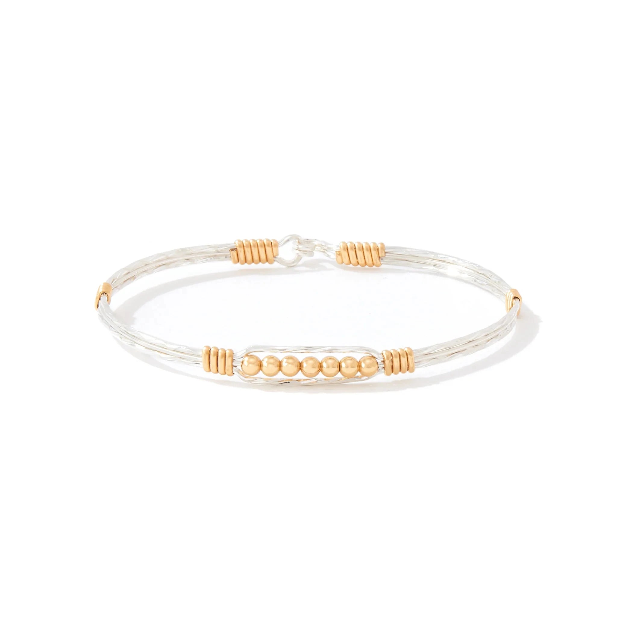 Bracelet with gold accents on a white background