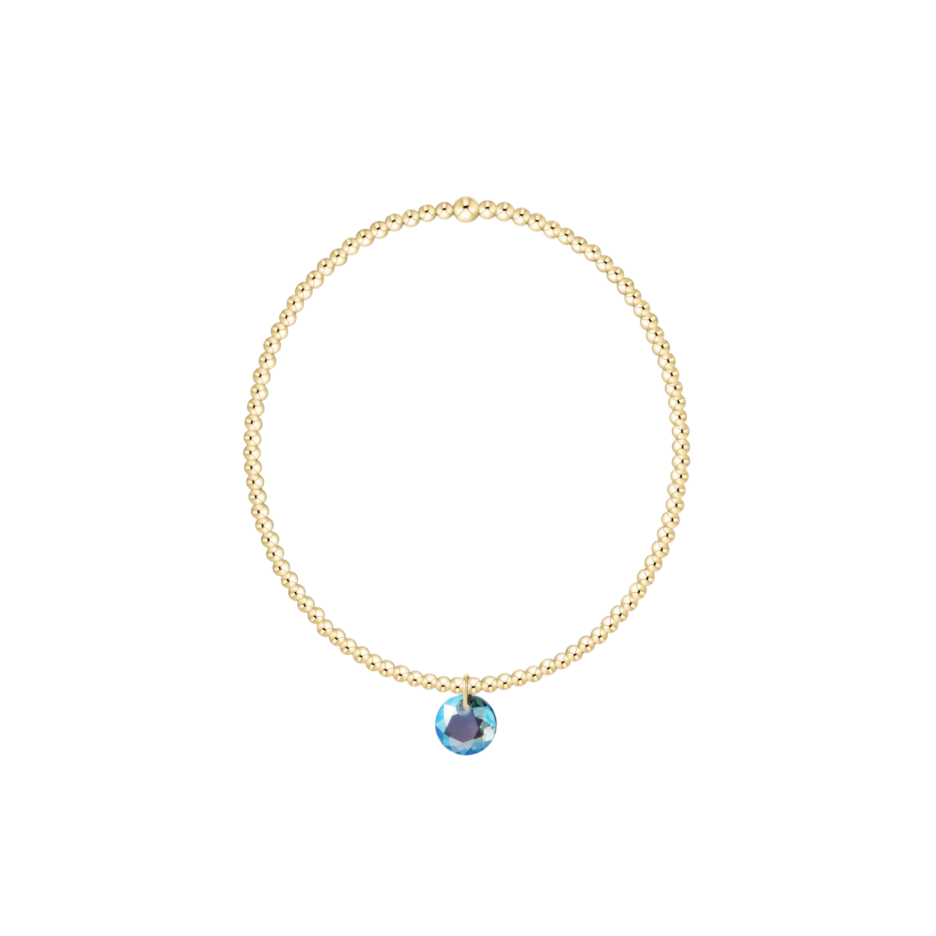 Gold necklace with a blue gemstone pendant on a white background