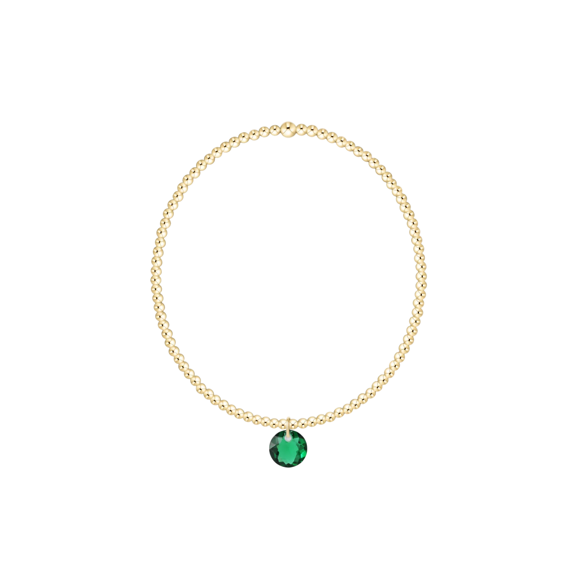 Gold necklace with a green gemstone on a white background