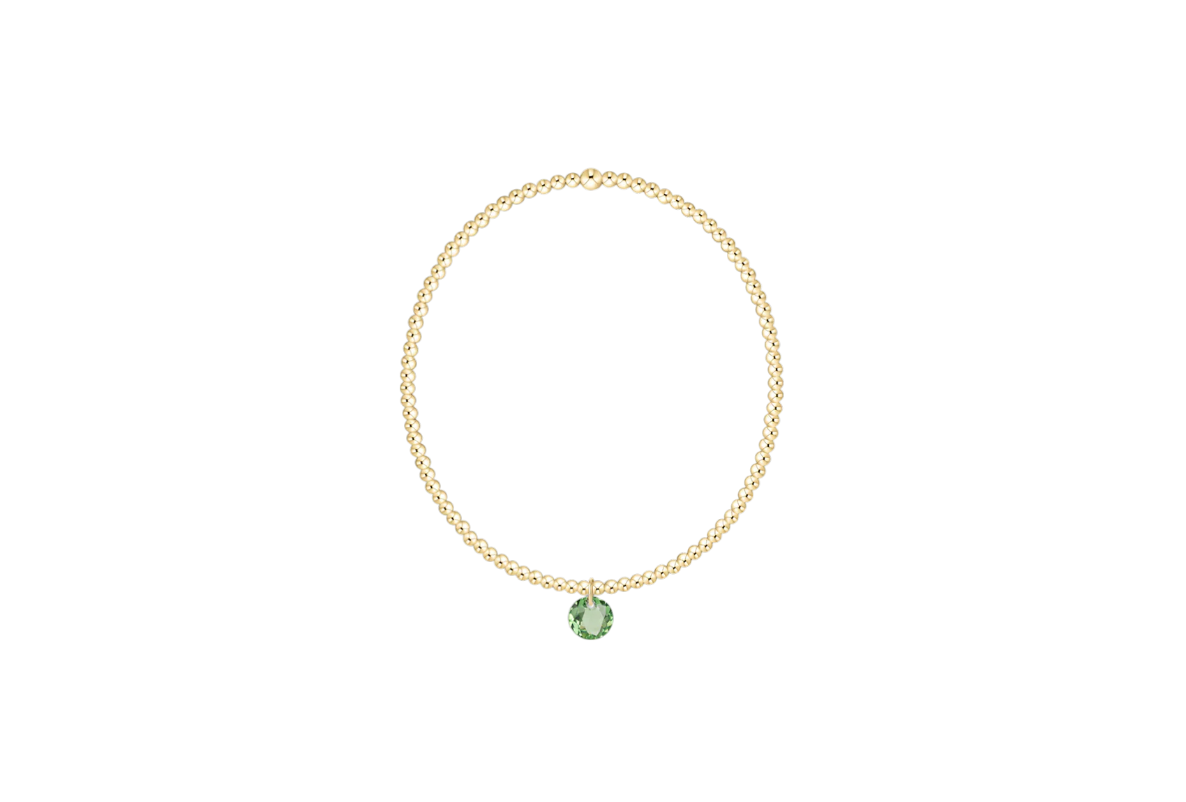 Gold bracelet with a green gemstone on a white background