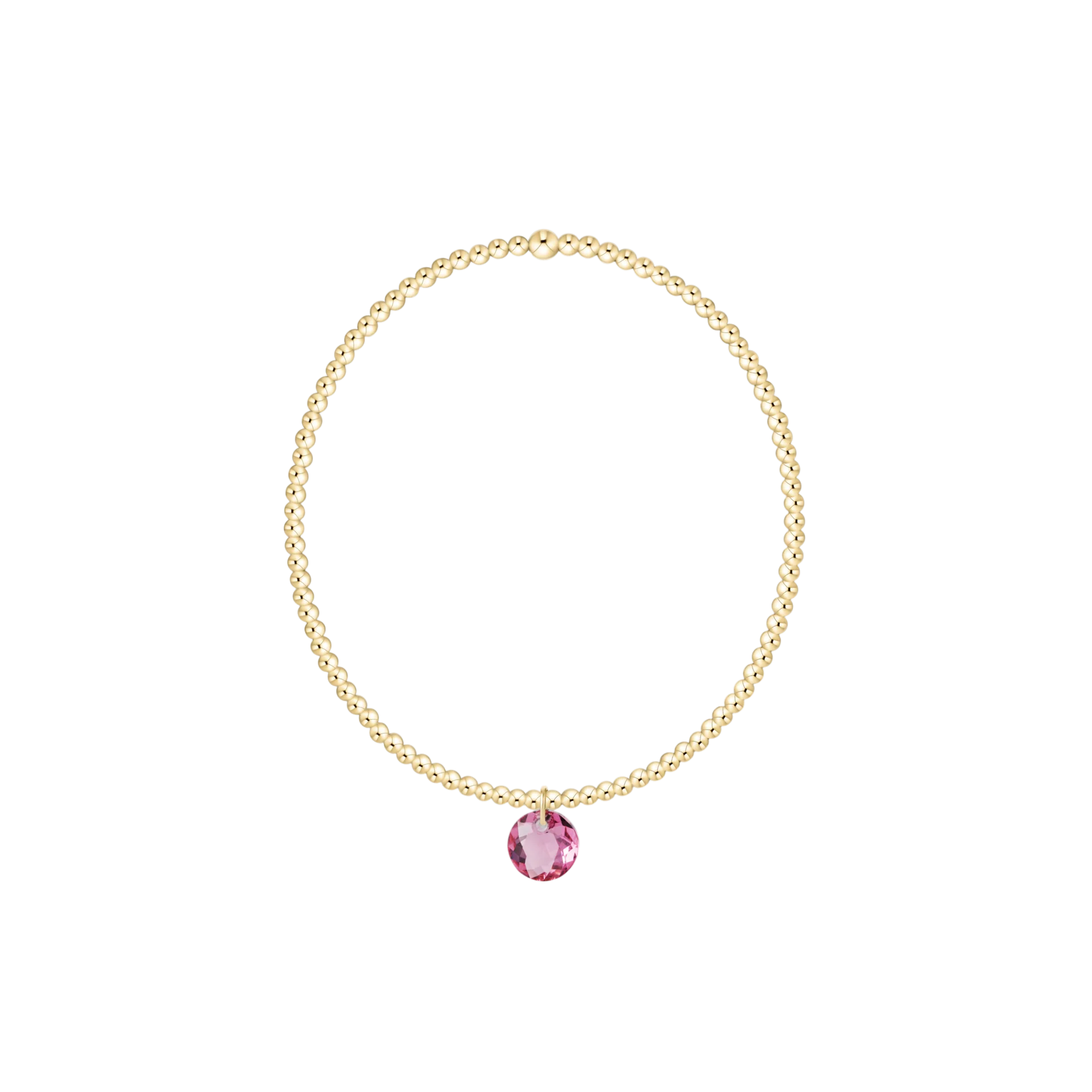 Gold necklace with a pink gemstone on a white background