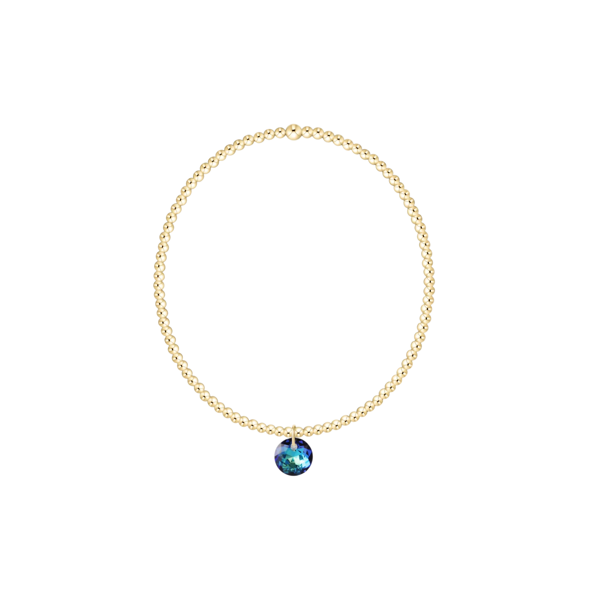 Gold necklace with a blue gemstone pendant on a white background