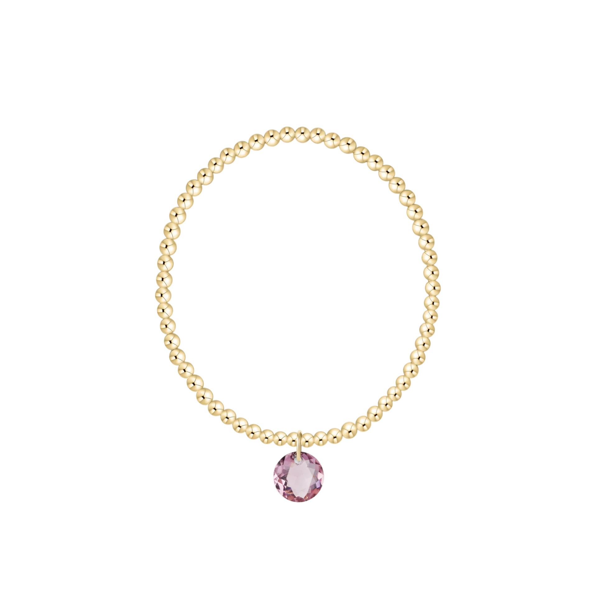 Gold beaded bracelet with pink gemstone charm