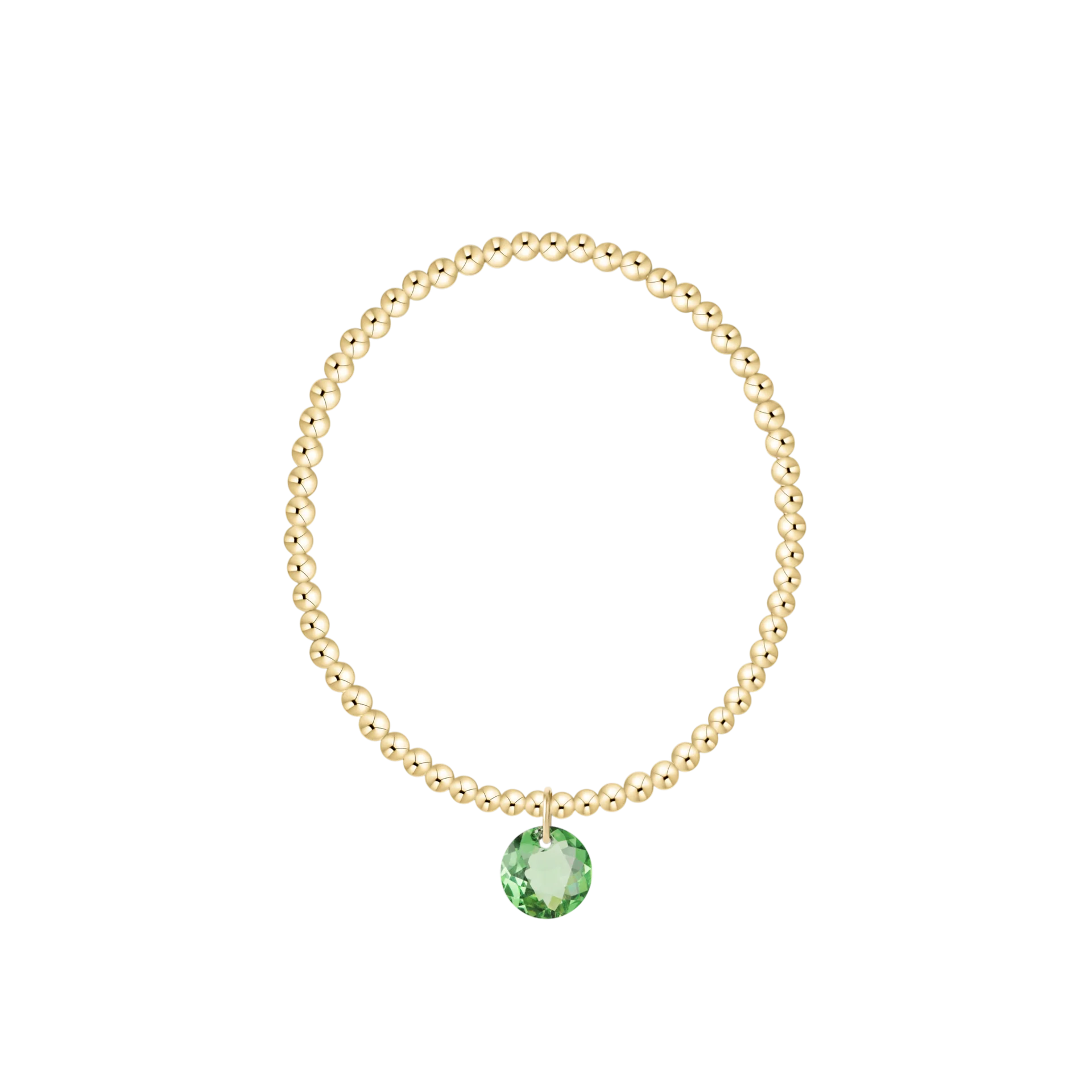Gold bracelet with a green gemstone on a white background