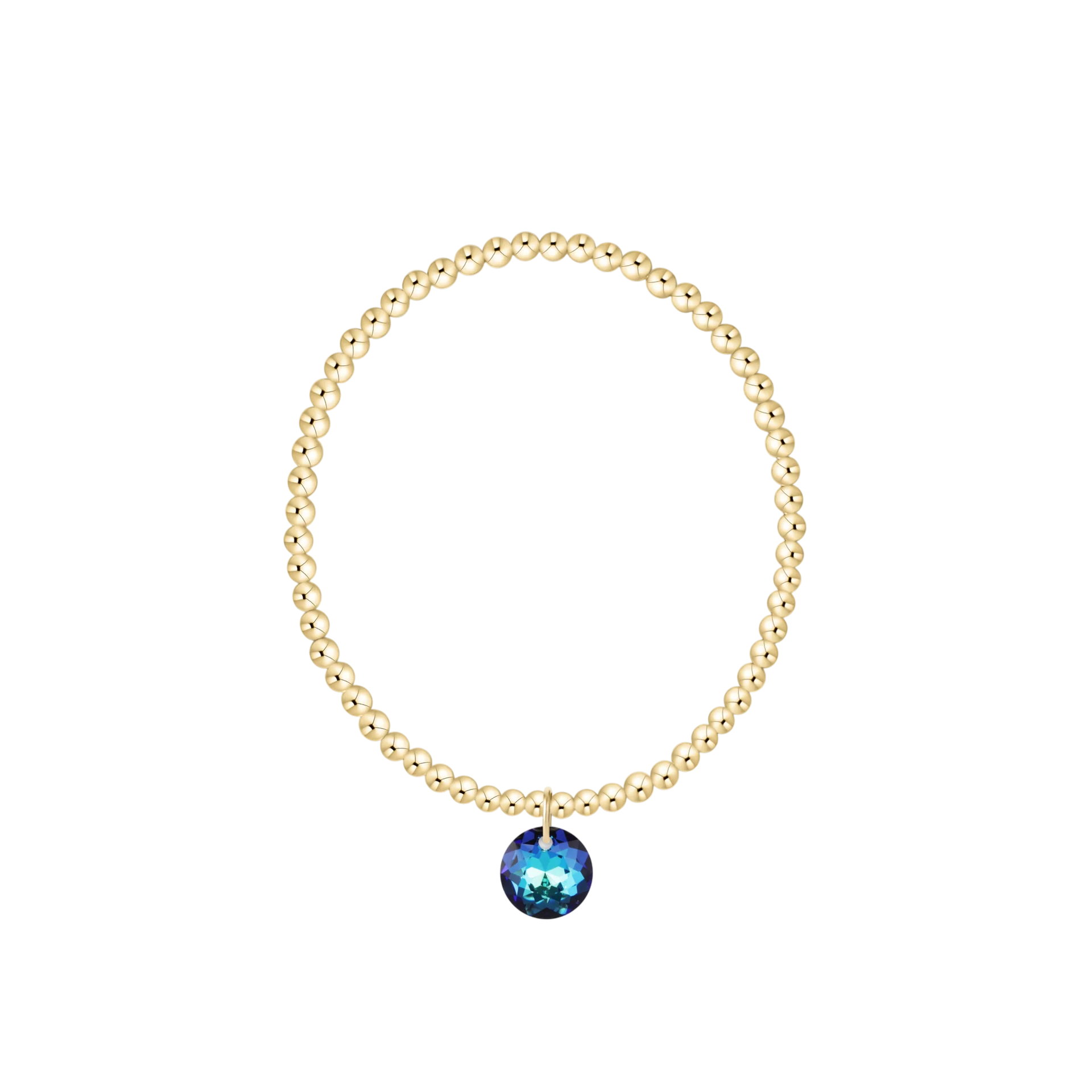 Gold bracelet with a blue gemstone on a white background