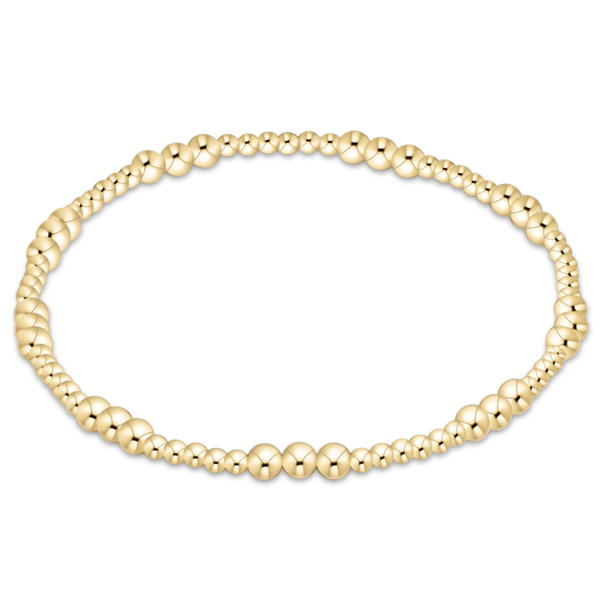 Gold beaded bracelet on a white background.