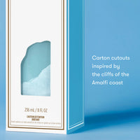Product packaging with a blue design inspired by the Amalfi coast on a light blue background.