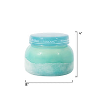 Turquoise jar with a white lid on a white background