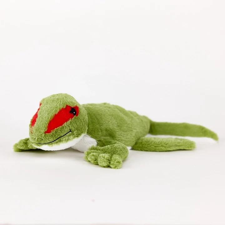 Green plush toy lizard with red marking on a white background
