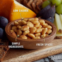 Wooden bowl of nuts with fruit and bread in the background, labeled 'Low Calorie', 'Simple Ingredients', and 'Fresh Spices'.