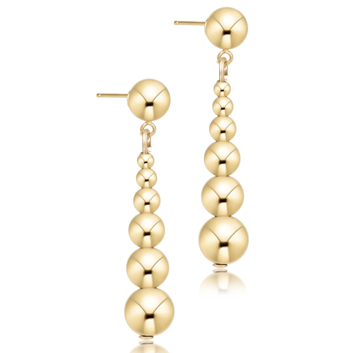 Gold graduated drop earrings starting with a small 2.3mm drop with six larger drops on a white background.