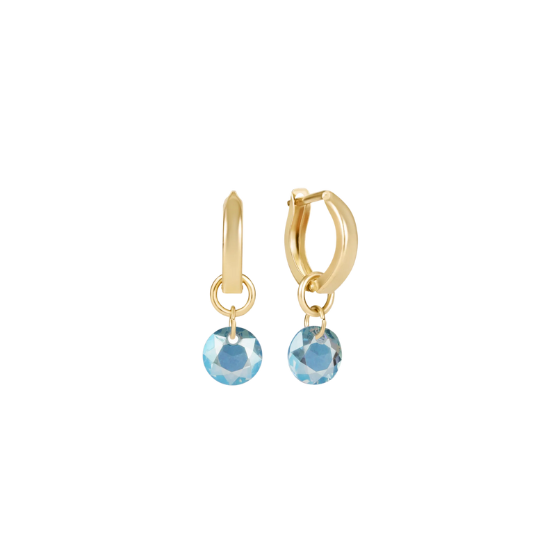 Gold hoop earrings with blue gemstone