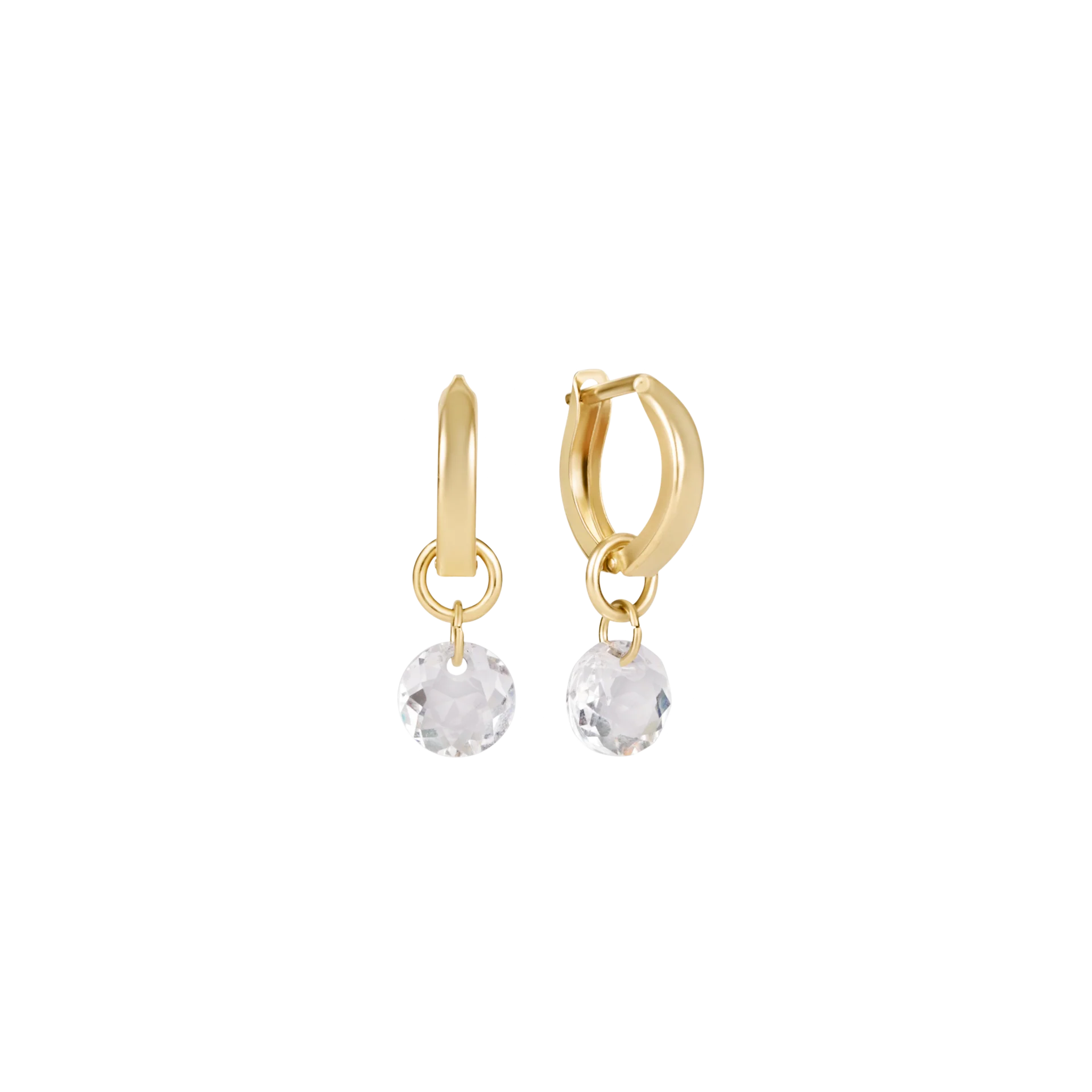 Gold hoop earrings with clear gemstones on a white background