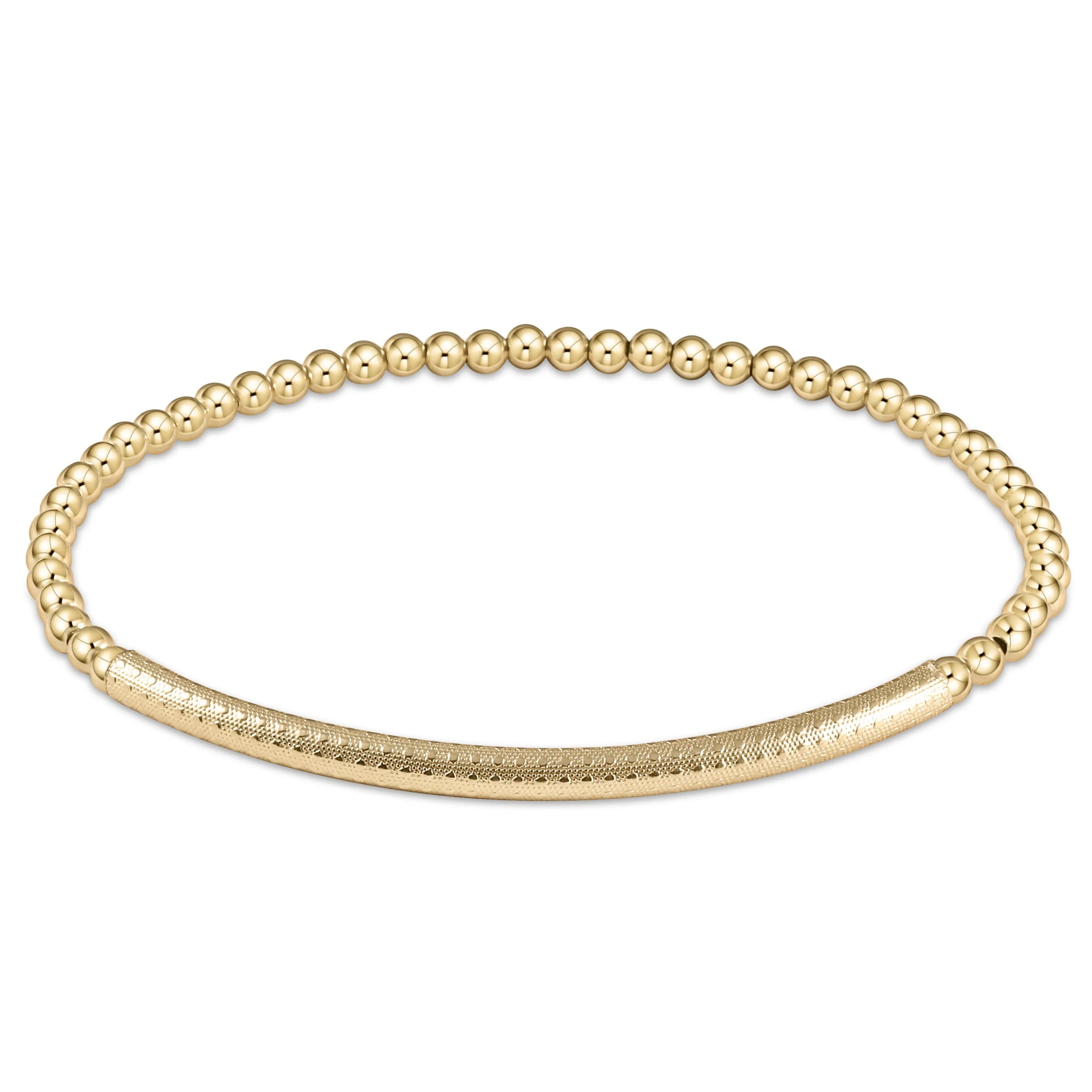 Gold beaded bracelet on white background