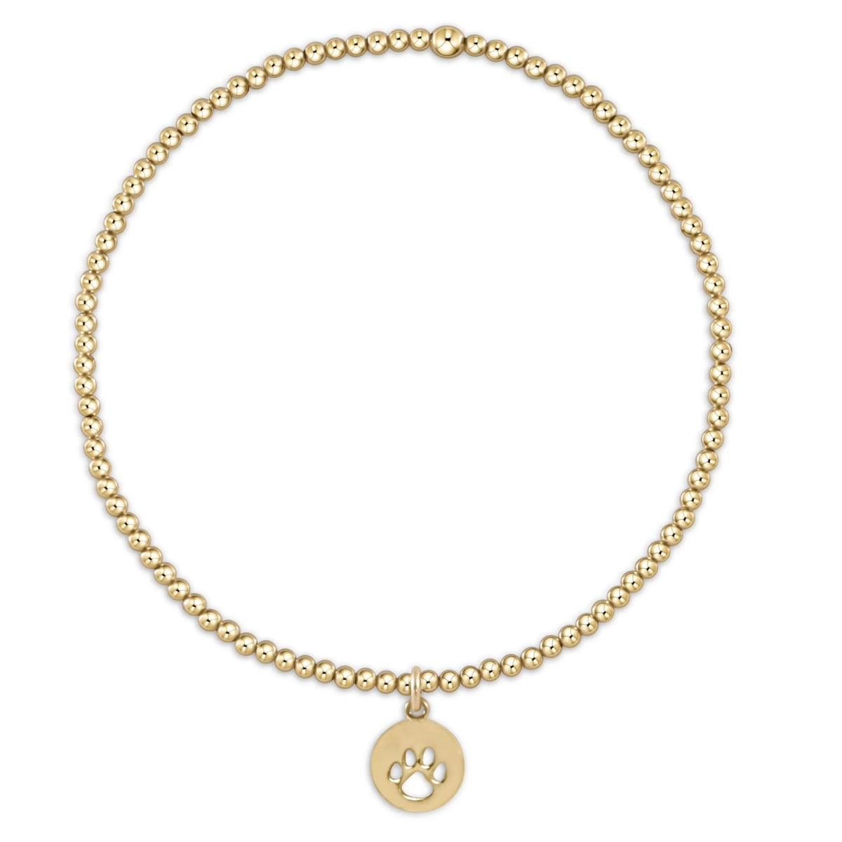 Gold beaded bracelet with small gold paw print charm on a white background