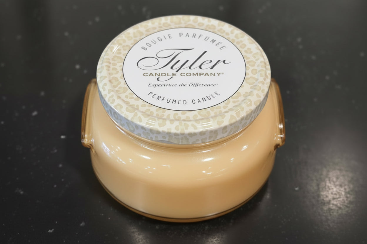 Tyler candle on a black surface