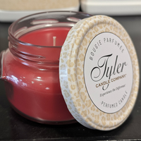 Red Candle with Tyler Candle Company on Lid
