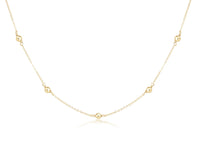 Gold necklace on a white background