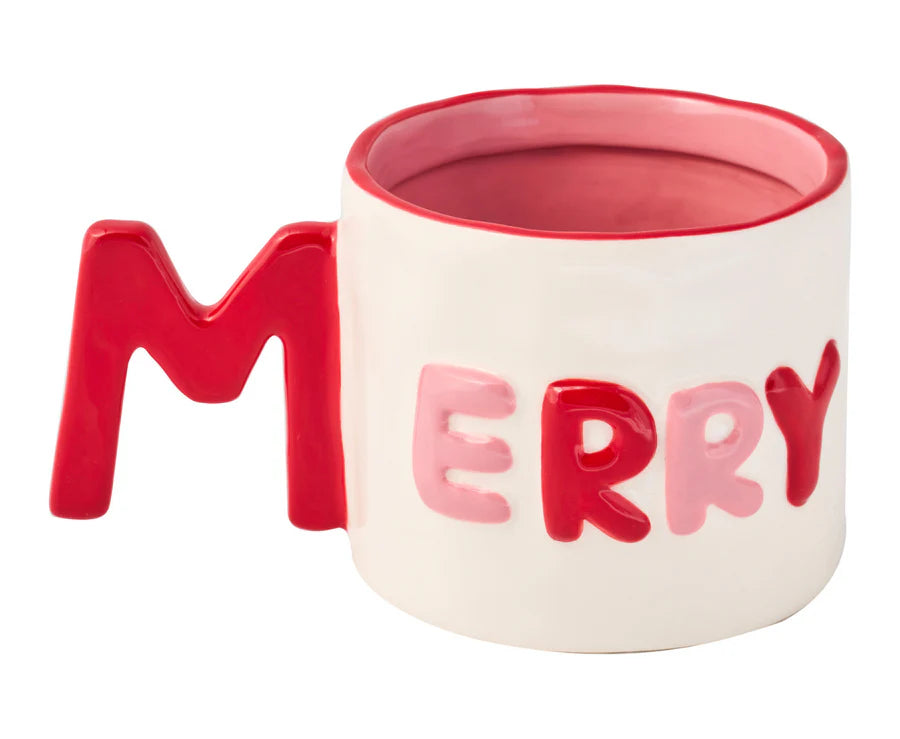 Mug with red handle and 'MERRY' text on a white background