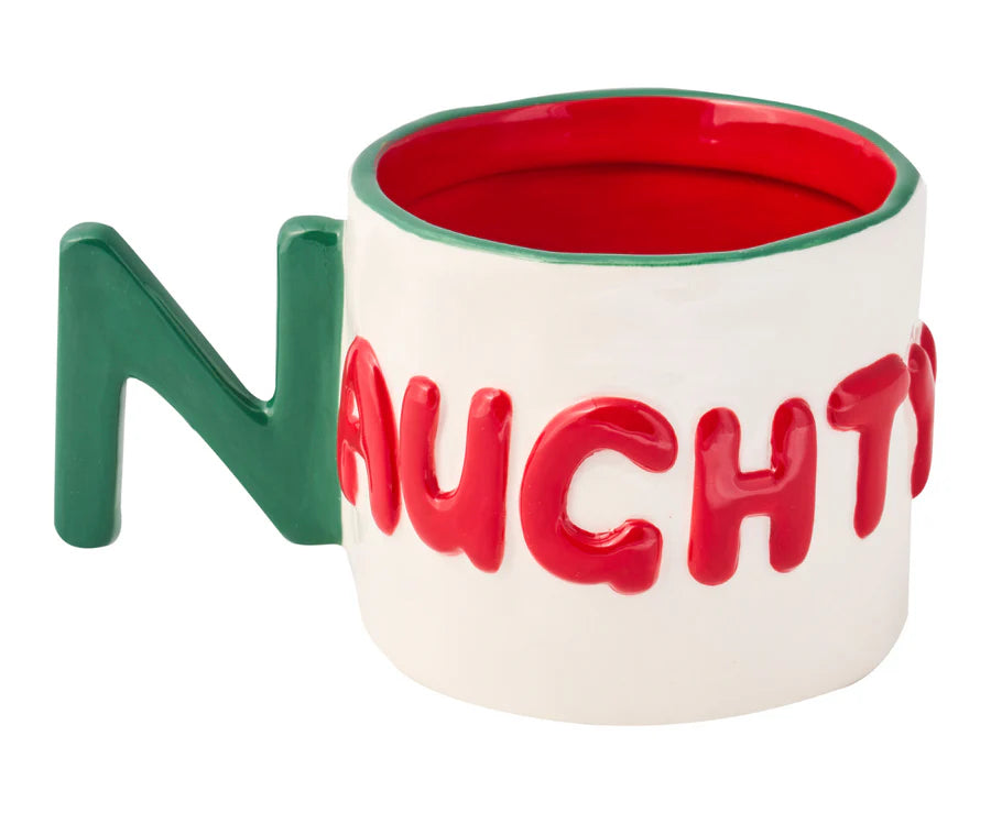 Mug with red interior, green handle, and 'Naughty' text on a white background