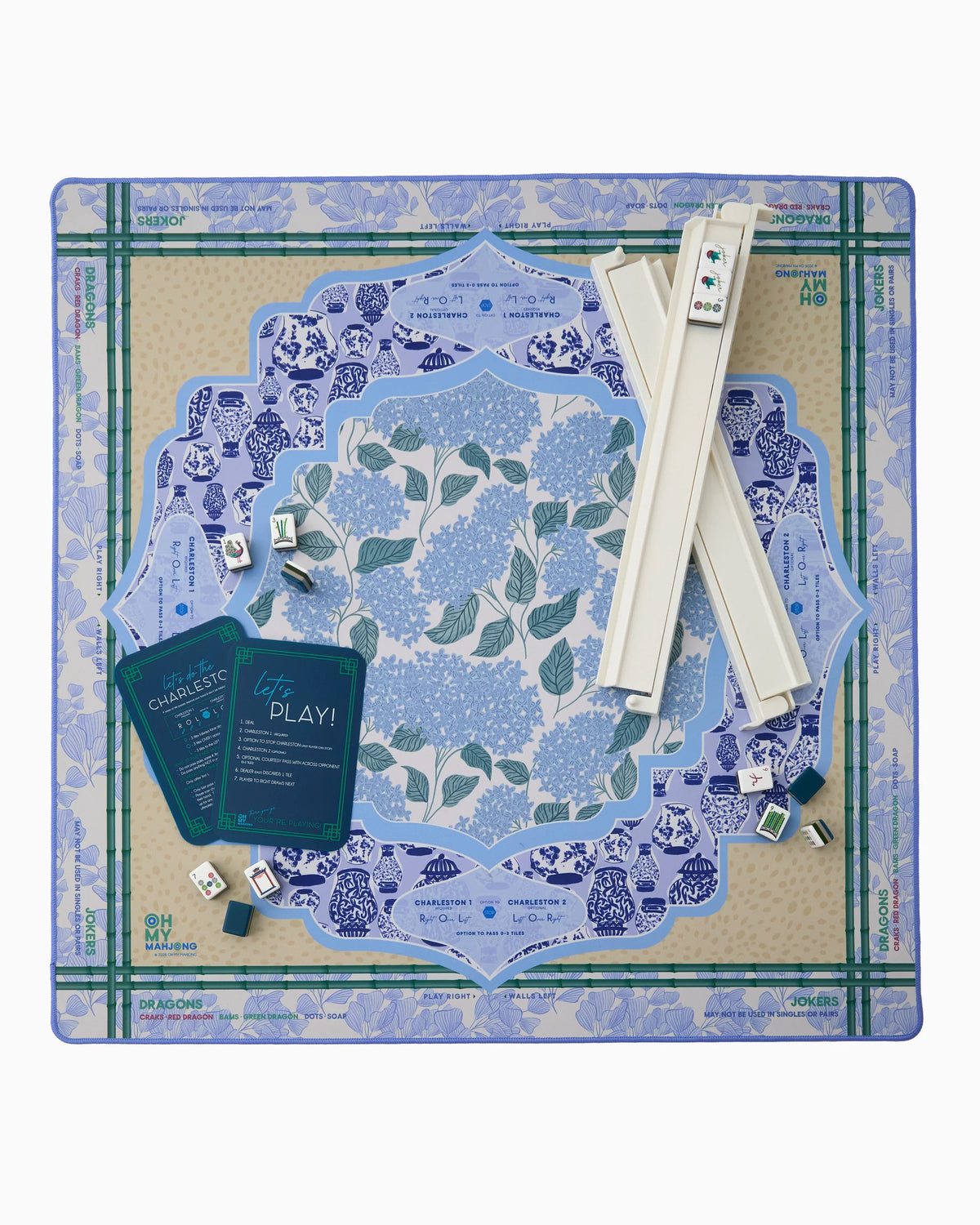 Mahjong Mat set with blue and green floral design on a white background