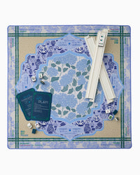 Mahjong Mat set with blue and green floral design on a white background