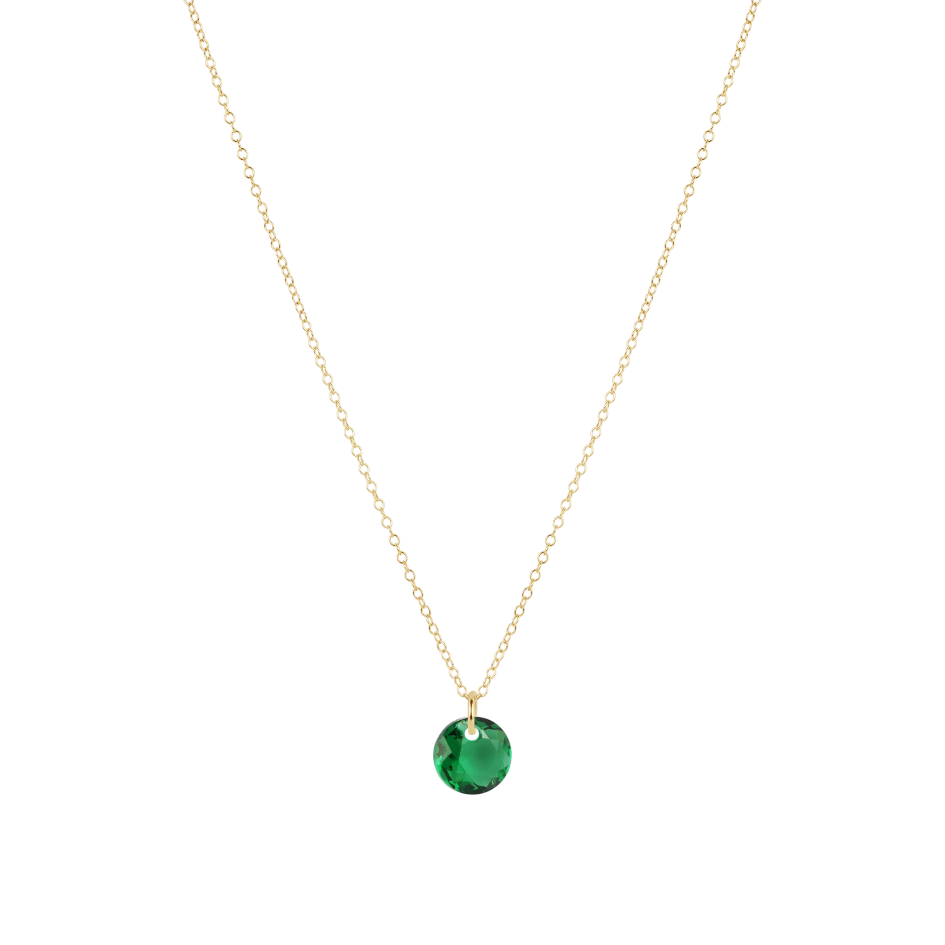 Gold necklace with a green gemstone pendant on a white background
