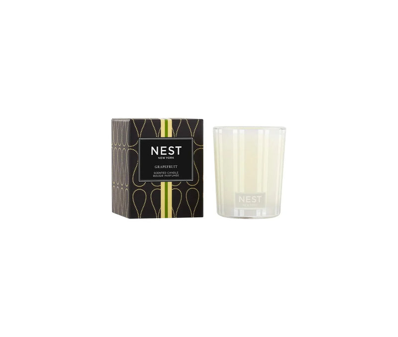 NEST grapefruit candle with packaging on a white background