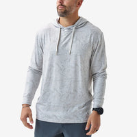Man wearing a gray hoodie on a white background