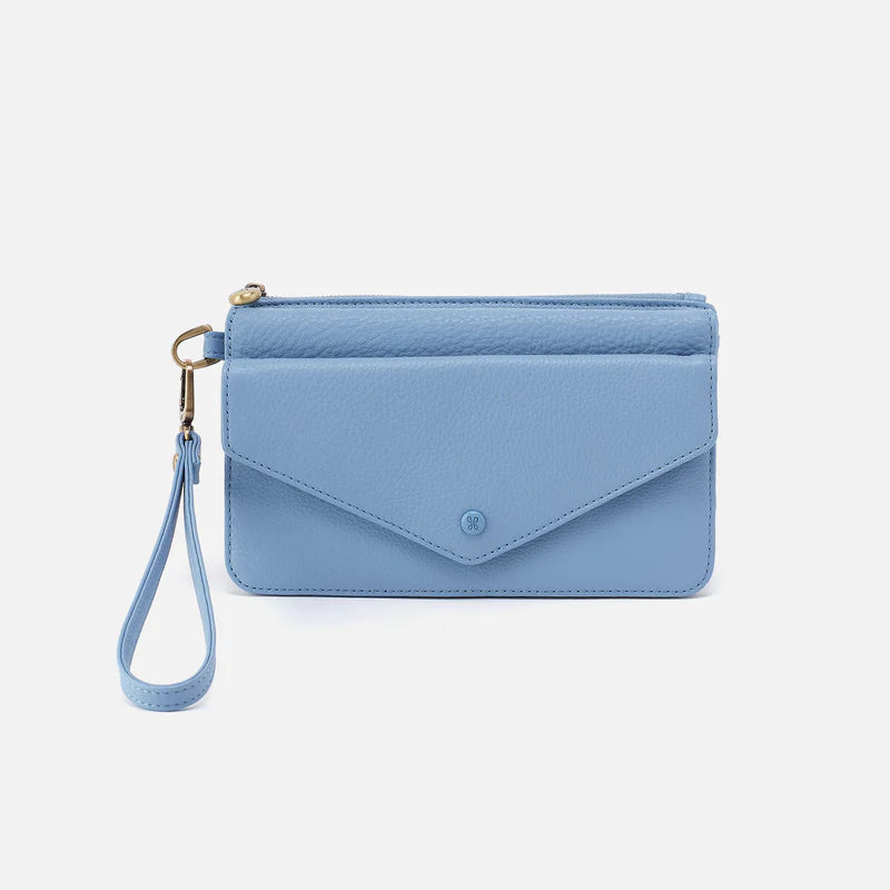 Blue wristlet purse on a light gray background