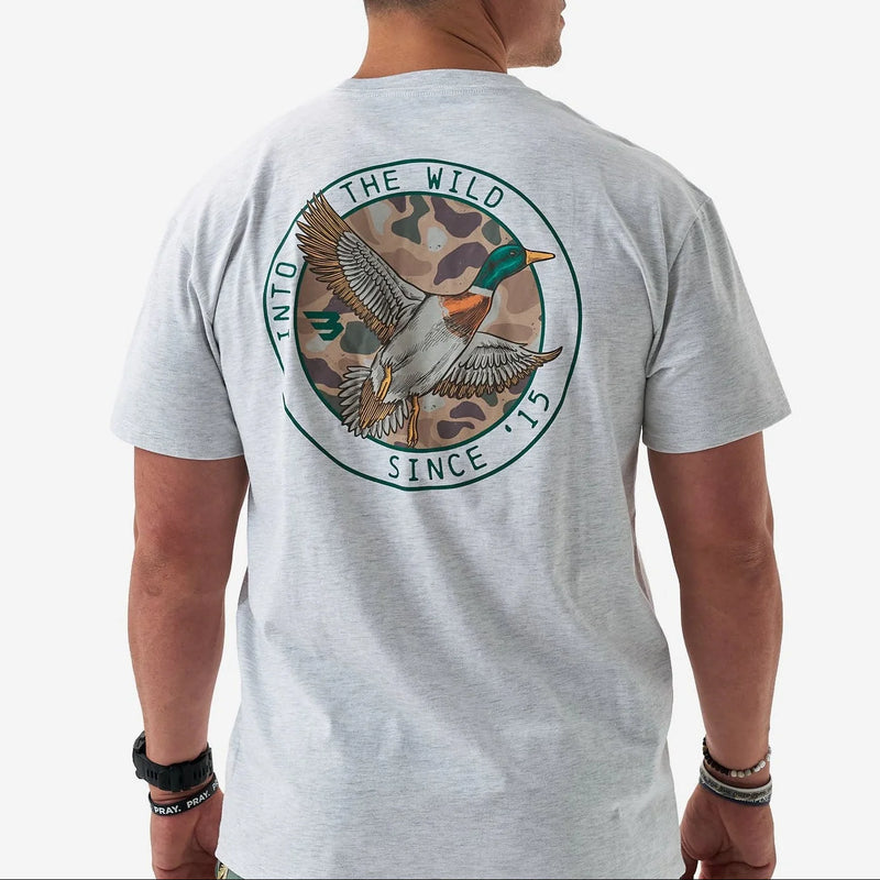 Gray t-shirt with a duck graphic and text on the back, worn by a person.