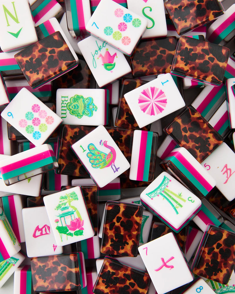 Collection of colorful and patterned tiles with various designs on a white background
