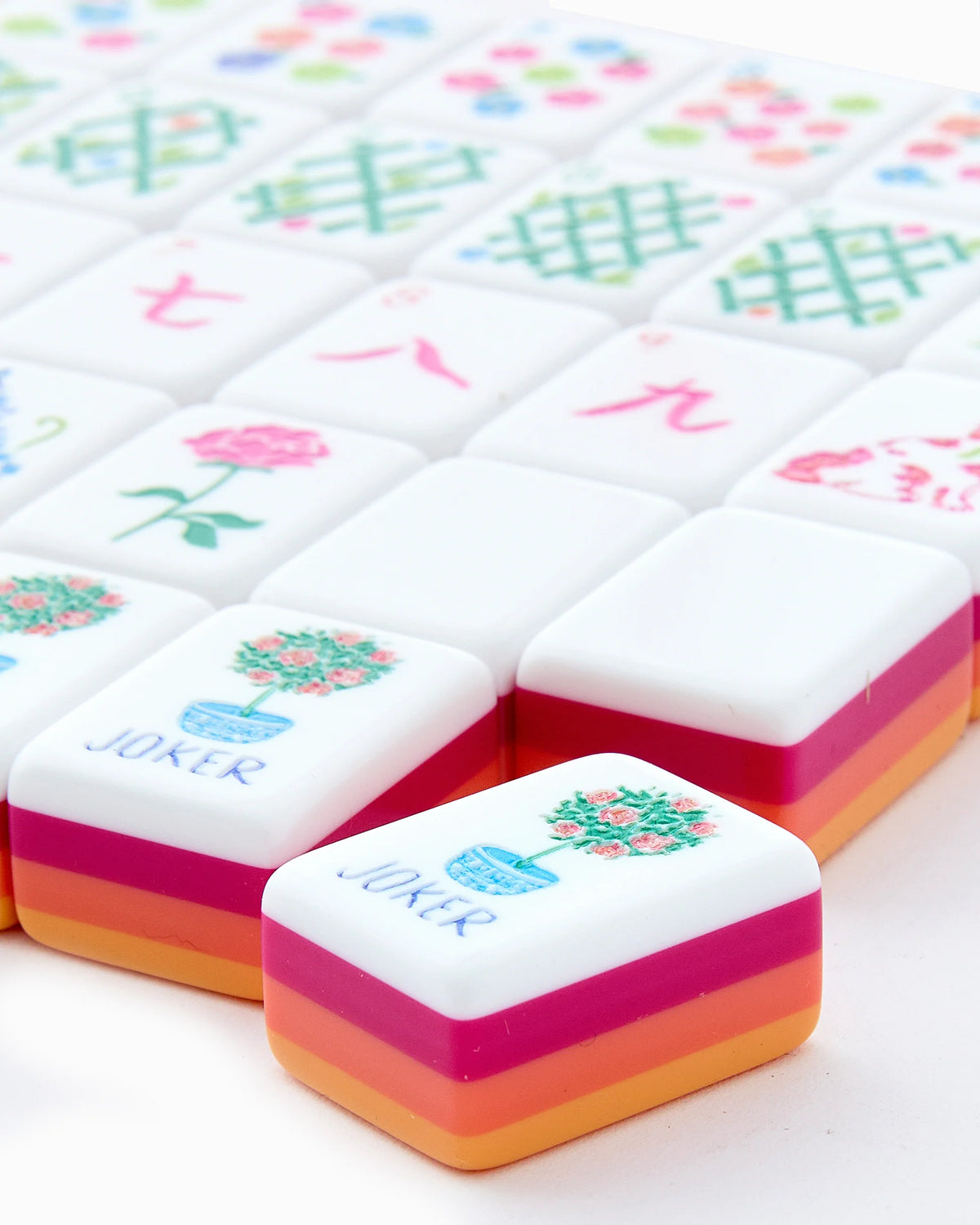 Colorful Mahjong tiles with 'JOKER' on a white background