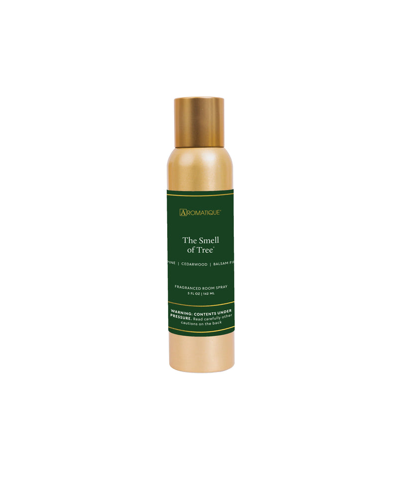 Gold and green bottle of 'The Smell of Tree' on a white background