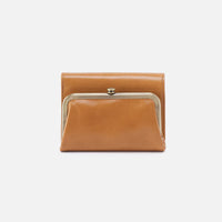 Brown leather clutch with a gold clasp on a white background