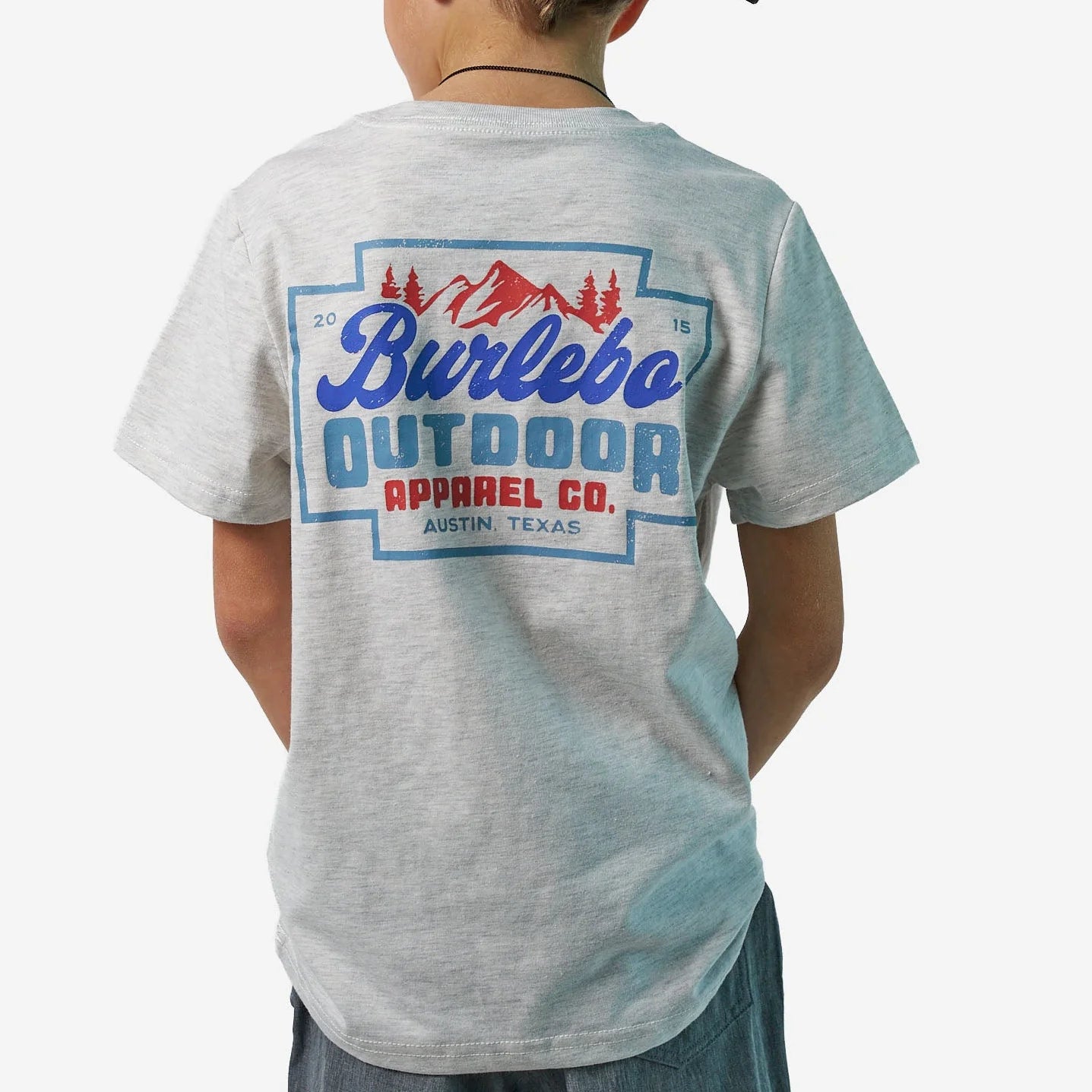 Gray t-shirt with 'Burlebo Outdoor Apparel Co.' logo on the back, worn by a person.