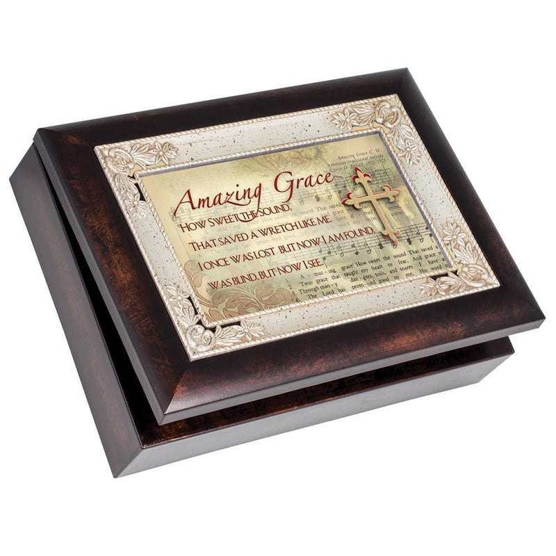 Decorative music box with 'Amazing Grace' text and cross design on a white background