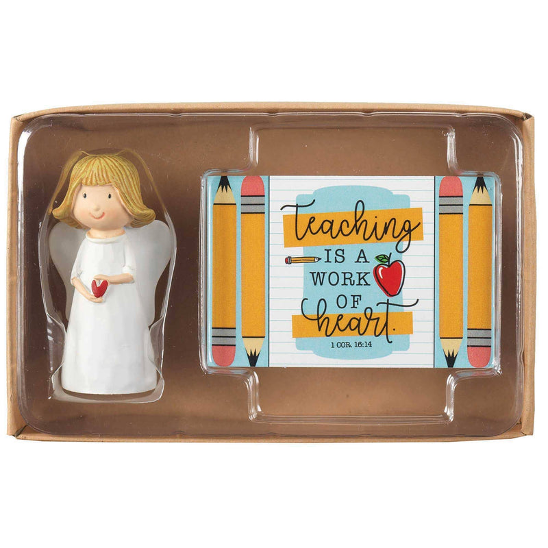 Packaged gift set with angel figurine and card in a clear window box