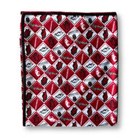 A folded square fabric item, likely a scarf or pocket square, featuring a repeating red, white, and black diamond pattern with the word 'Nougats' and a stylized cat logo.