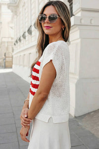 Woman wearing a white crochet top and red striped shirt outdoors.