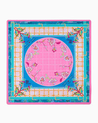 A square mahjong mat featuring a vibrant pink central circle with floral motifs, surrounded by a blue border, a white lattice grid, and a turquoise outer frame with gold accents and botanical details.