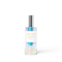Bottle of 'Beach Vacay' cologne with colorful label on a white background