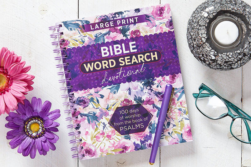 Floral-themed Bible Word Search devotional book with a pen on a white surface.