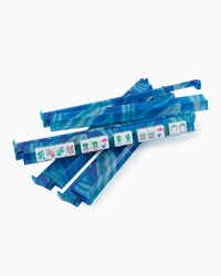 Blue marbled patterned mahjong rack and pusher set on a white background