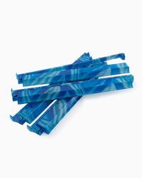 Blue marbled patterned mahjong rack and pusher set on a white background