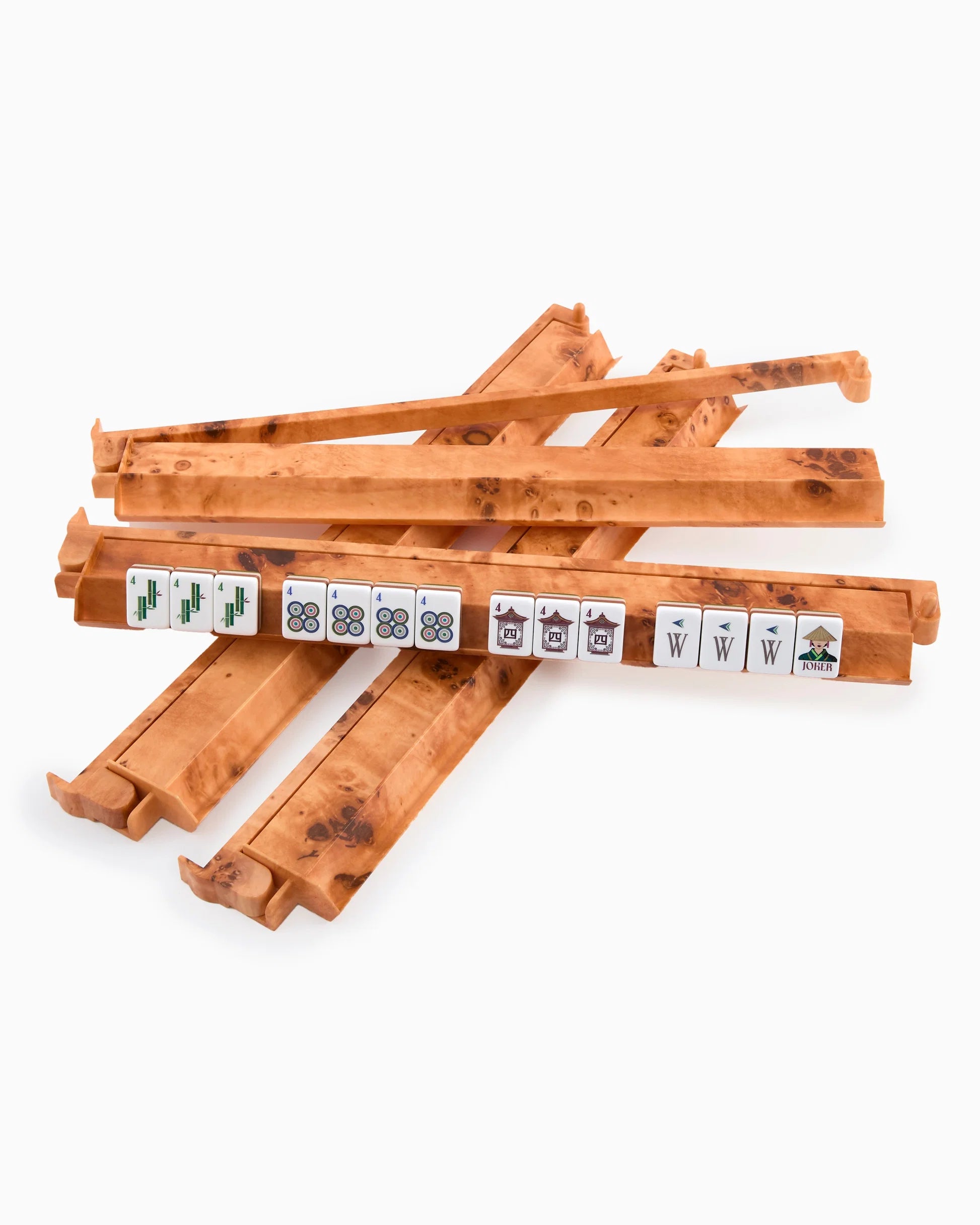 Wooden mahjong rack set with several angled wooden racks holding white tiles with green and black markings, photographed on a clean white background.
